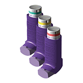 Three purple medical inhalers are lined up side by side. Each inhaler has a different colored band on the top&mdash;green, yellow, and red.