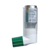 Image of a metered-dose inhaler with a green cap and a visible label.