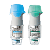 Two inhalers are depicted side by side. The one on the left has a blue cap, and the one on the right has a green cap. Both have labels and clear sections at the bottom, set against a white background.