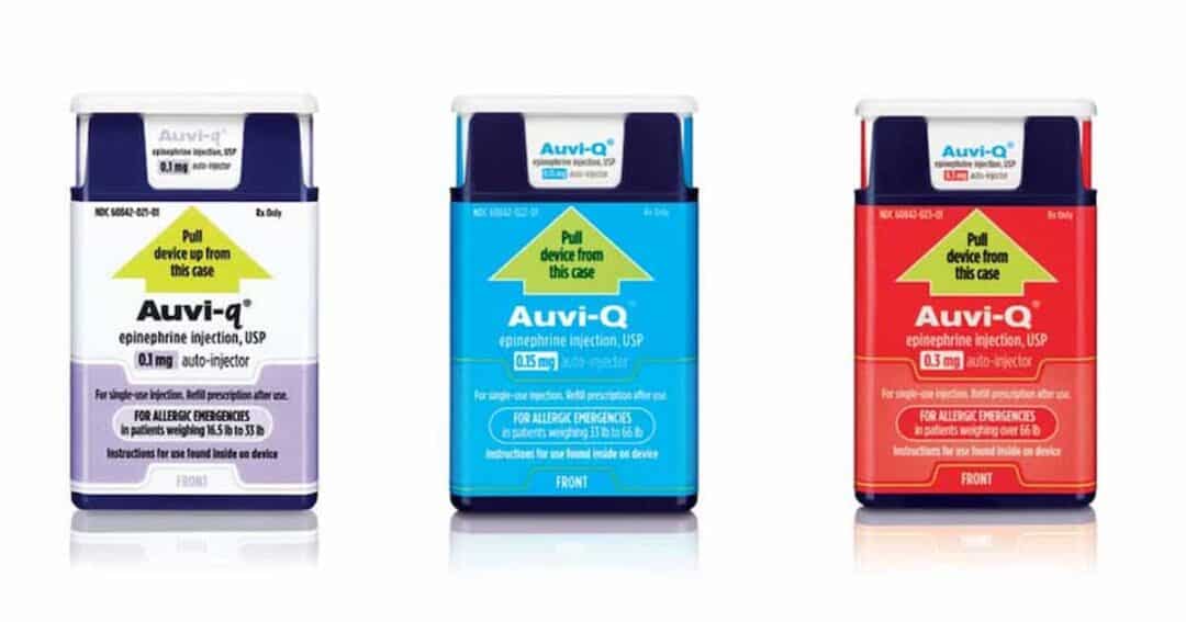Image of three Auvi-Q epinephrine injection devices. They are in different colored cases: purple for 0.1 mg, blue for 0.15 mg, and red for 0.3 mg. Each has instructions on pulling the device from the case for use in allergic emergencies.