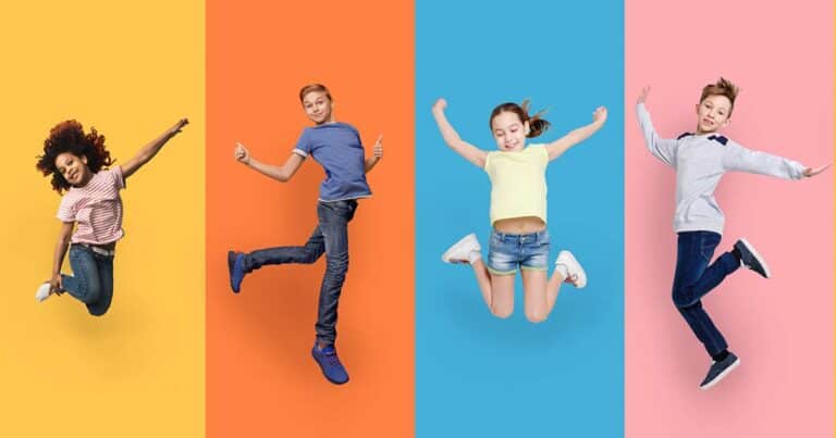 Four children of various races and ages in a "jumping for joy" pose. Each one is against a different color backgdrop.