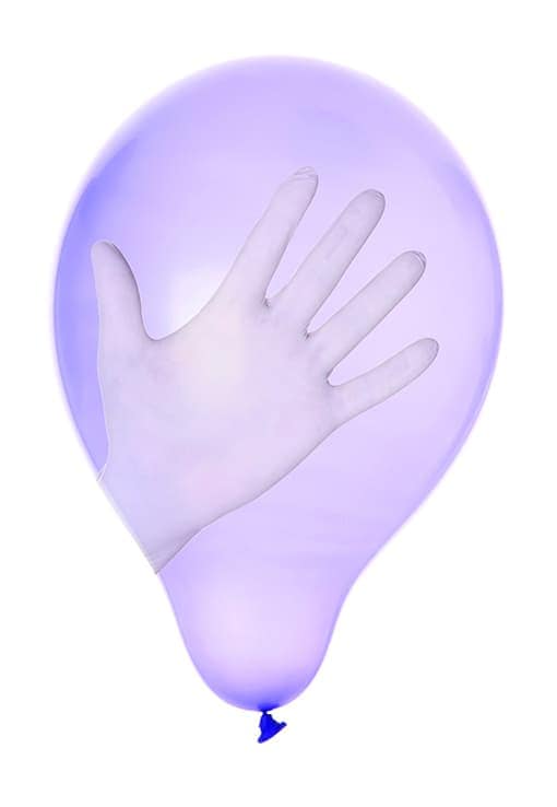 A purple latex glove inflated to resemble a balloon, with the fingers pointing upward and a blue tied end at the bottom, creating a playful and unique shape.
