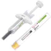 The image shows a medical syringe and a test tube. The syringe has a plunger with a transparent barrel, and the test tube has a yellow cap with a label. Both are positioned against a white background.