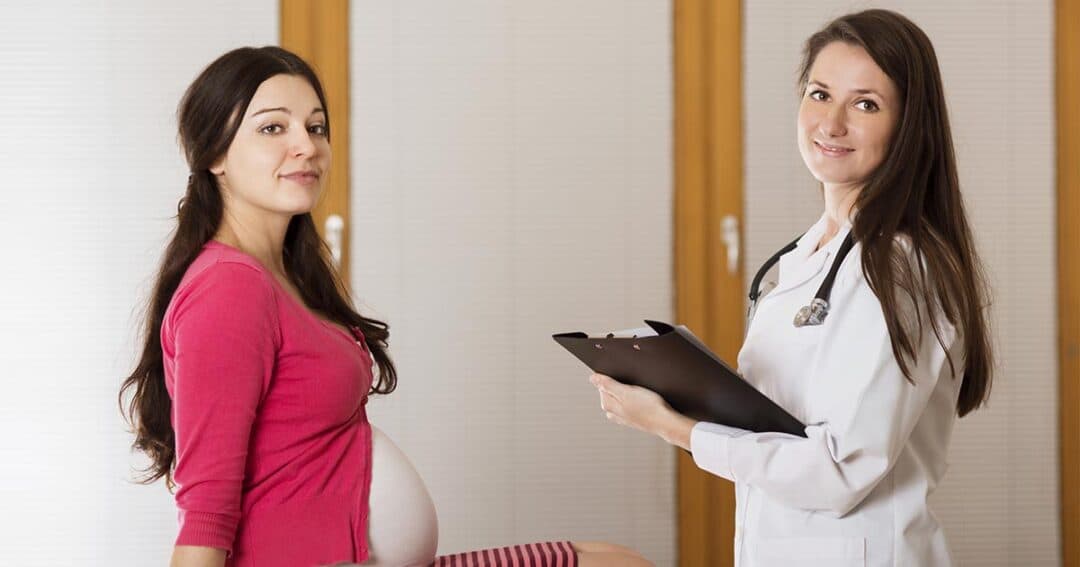Asthma and Pregnancy 9 Pregnant Romani woman discussing asthma medication with her doctor.